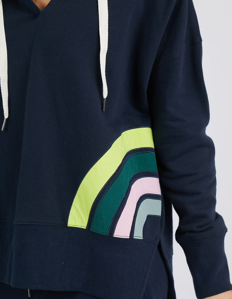 Over the Rainbow Hoodie - Navy by Elm is available at Rawspice Boutique. 