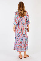 The Sky Augusta Midi Dress by LULALIFE is available at Rawspice Boutique.
