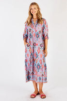 The Sky Augusta Midi Dress by LULALIFE is available at Rawspice Boutique.