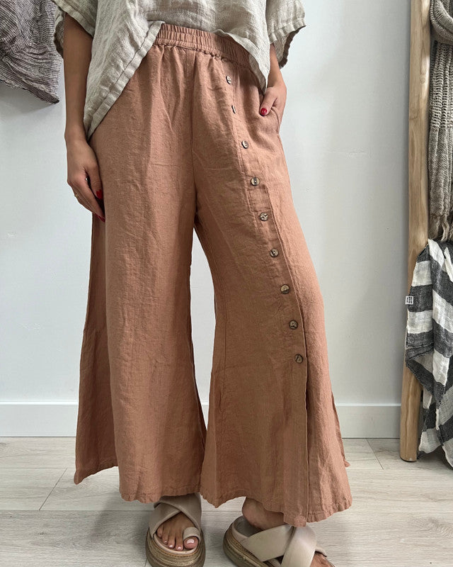 The Clay Bruna Button Wide Legged Pants by Rustic Linen are available at Rawspice Boutique.