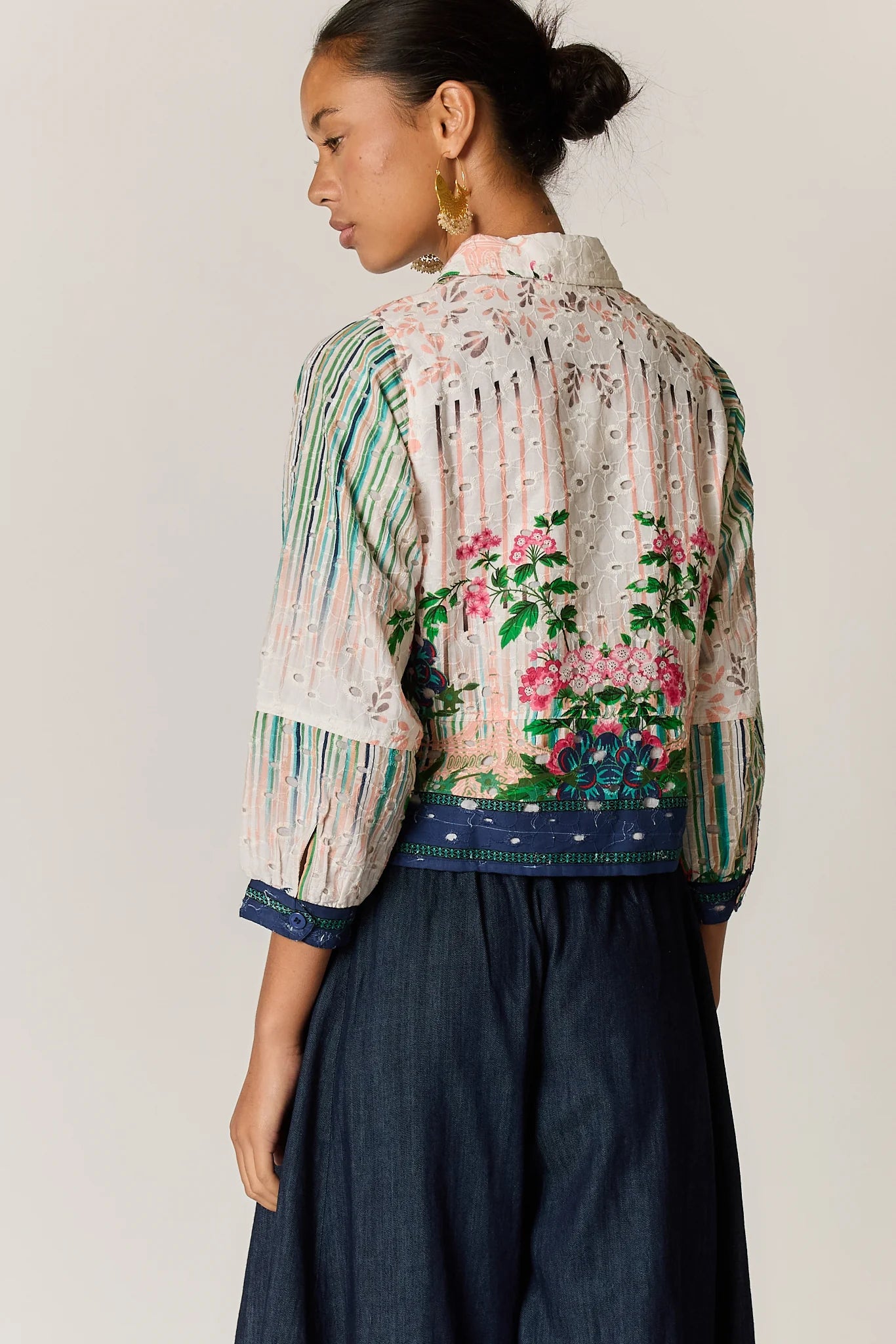 Roseanna bomber jacket in a multi-coloured patchwork-inspired floral print with a broderie basecloth.