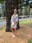 Grenada Del Nova short set displayed in bright natural light, featuring a relaxed fit, vibrant summer print, and soft, breathable fabric.