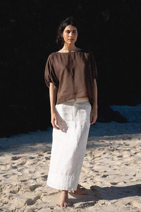 The Lily Pilly Tina Top in chocolate linen is designed with a relaxed silhouette, lightweight feel, and natural textured weave.