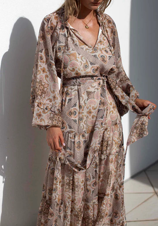 The Paradiso Maxi Dress by THREE OF SOMETHING is currently available at Rawspice Boutique.