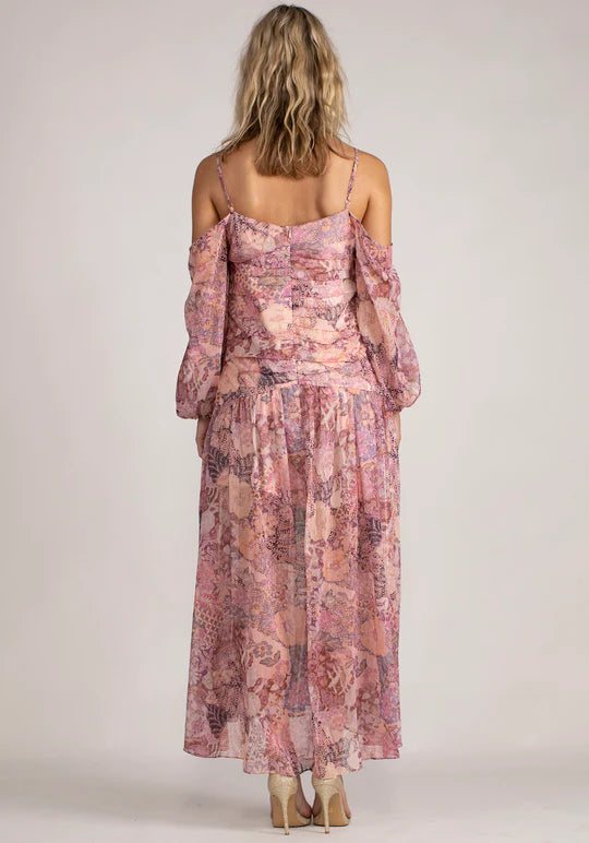 The Imagination Phoenix Maxi Dress by THREE OF SOMETHING is currently available at Rawspice Boutique.