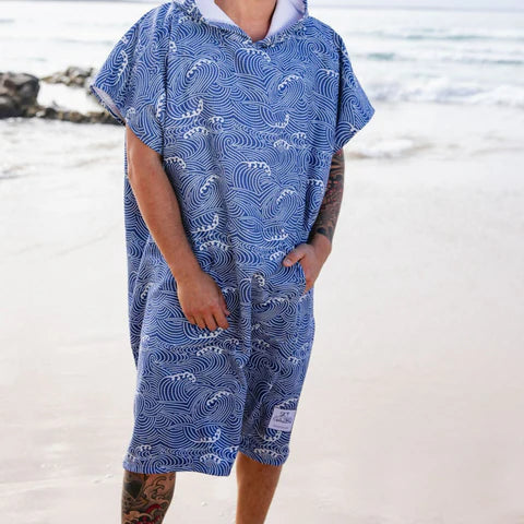 The Reef Surf Poncho is a sand-free, super-absorbent, quick-drying hooded towel. Lightweight, antibacterial and soft, with a pocket and optional waist tie.