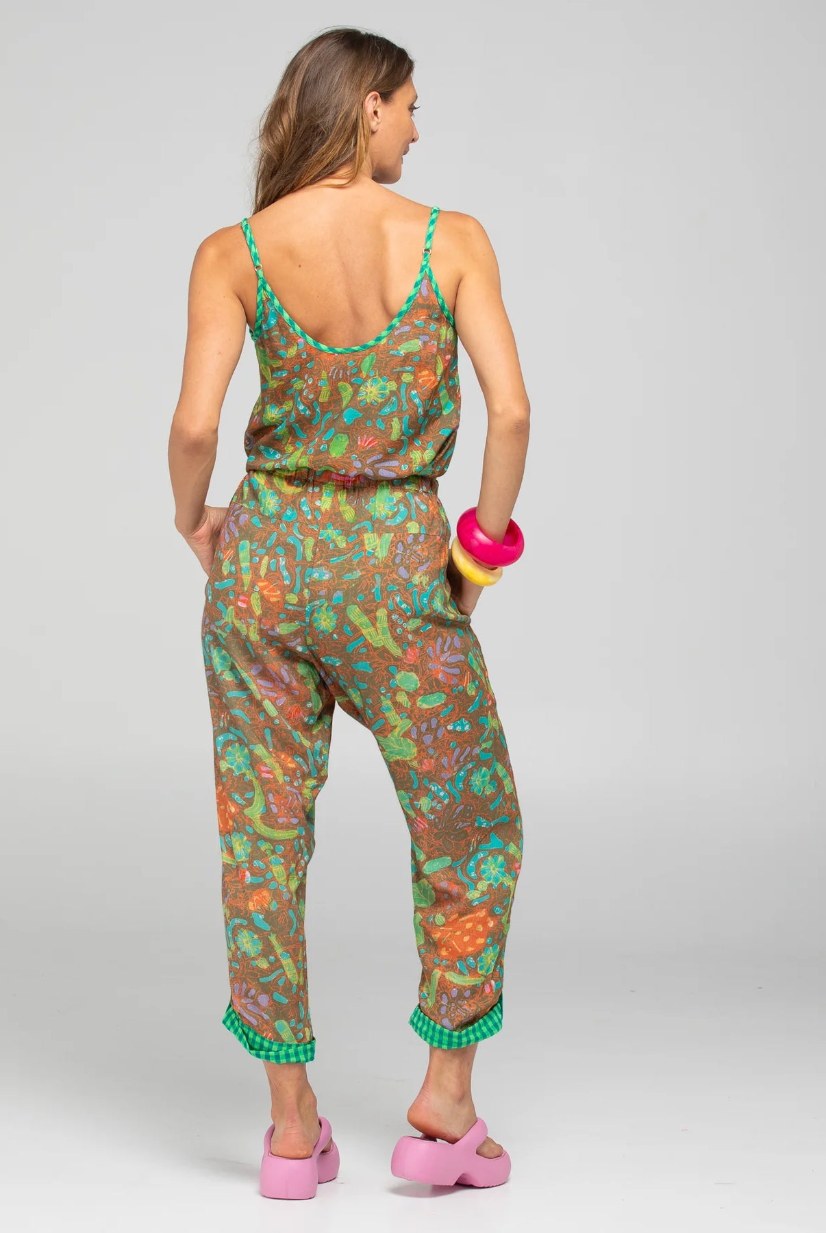 Boom Shankar Rimi Pant in vibrant Rimini print, featuring a contrast Verde waist tie, elasticated gathered waistband, side pockets, and cuffed hems with button and tab detailing.