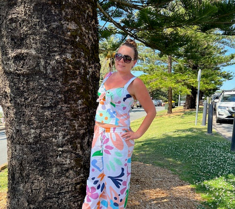 Boom Shankar Juno Top in Sorrento print. Relaxed fit cotton top with short sleeves and round neckline, featuring a blue and white geometric pattern.
