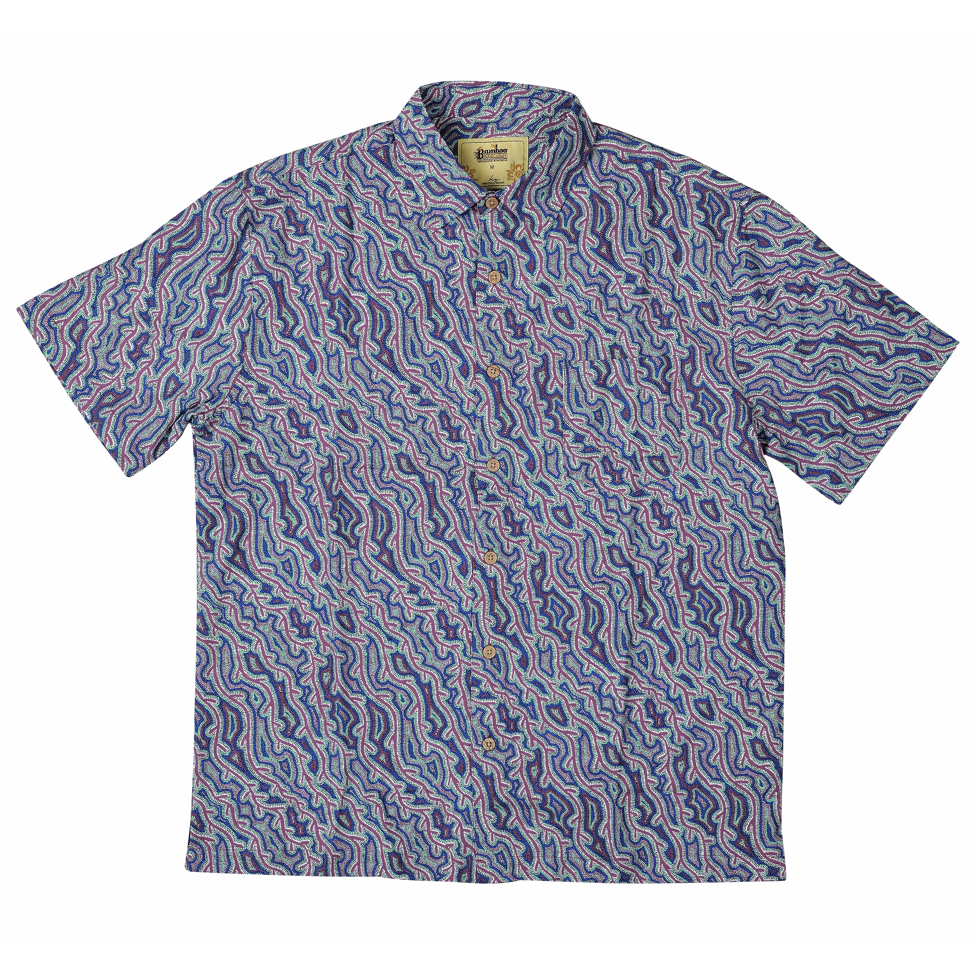 Men’s Short Sleeve Bamboo Shirt – Yarla Jukurrpa, crafted from organically grown bamboo with a loose fit, chest pocket, and coconut-shell look buttons.