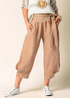 The Addison Linen Pant in Desert. Breathable linen trousers with a tie waist and side pockets, styled for relaxed, everyday elegance.