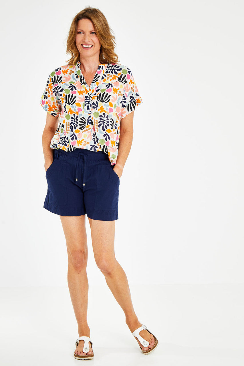 White lightweight cotton beach shorts for coastal summer wear