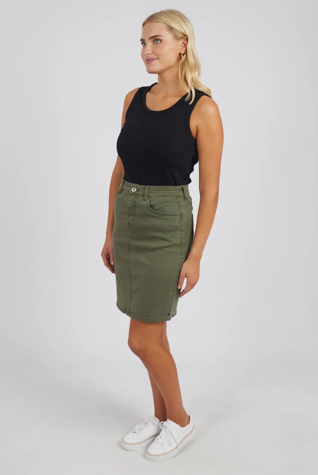 The Washed Khaki Belle Denim Skirt by Elm is available at Rawspice Boutique.