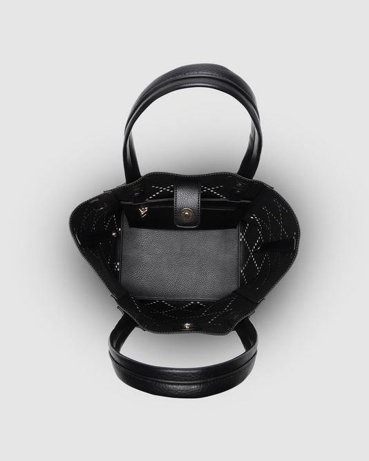 Louenhide Baby Bermuda in Black, a PU top-handle bag with diamond laser-cut design, removable adjustable strap, internal zip pocket, extra internal bag, and light gold hardware. Dimensions: 15 x 10.5 x 7 inches.