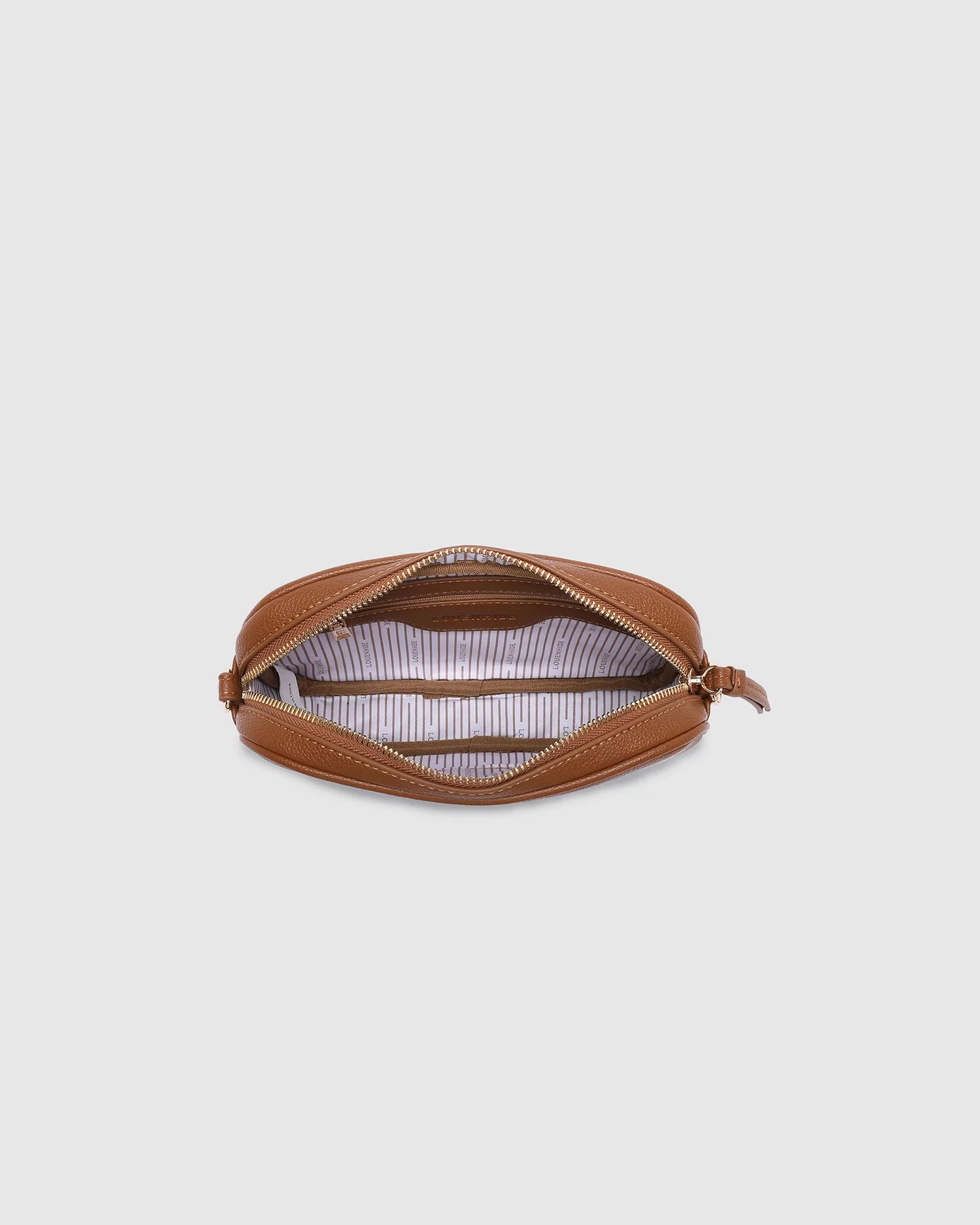 Bianca Crossbody Bag in tan vegan leather with zip closure, light gold hardware, and adjustable crossbody strap displayed front view.