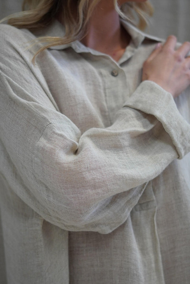 Natural Cecilia gauze linen top with button front, relaxed fit and soft, breathable stonewashed texture.