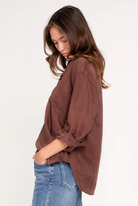Oversized Boyfriend linen shirt in cinnamon, made from 100% organic Belgian linen, featuring a pre-washed buttersoft finish, French seams, tab sleeves, and a scoop hem for a relaxed, stylish fit.
