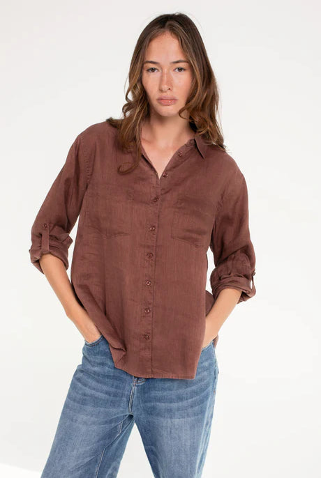 Oversized Boyfriend linen shirt in cinnamon, made from 100% organic Belgian linen, featuring a pre-washed buttersoft finish, French seams, tab sleeves, and a scoop hem for a relaxed, stylish fit.