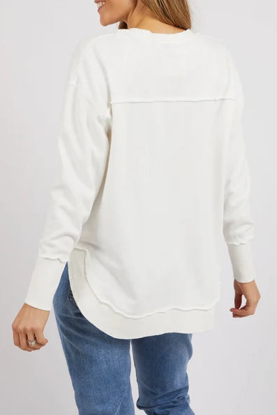 Delilah Crew jumper in Vintage White featuring a crew neckline, ribbed detailing, and a relaxed fit with a curved hem.