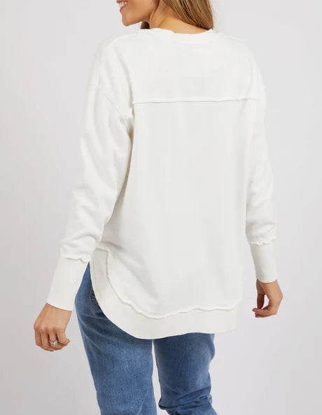 Delilah Crew jumper in Vintage White featuring a crew neckline, ribbed detailing, and a relaxed fit with a curved hem.
