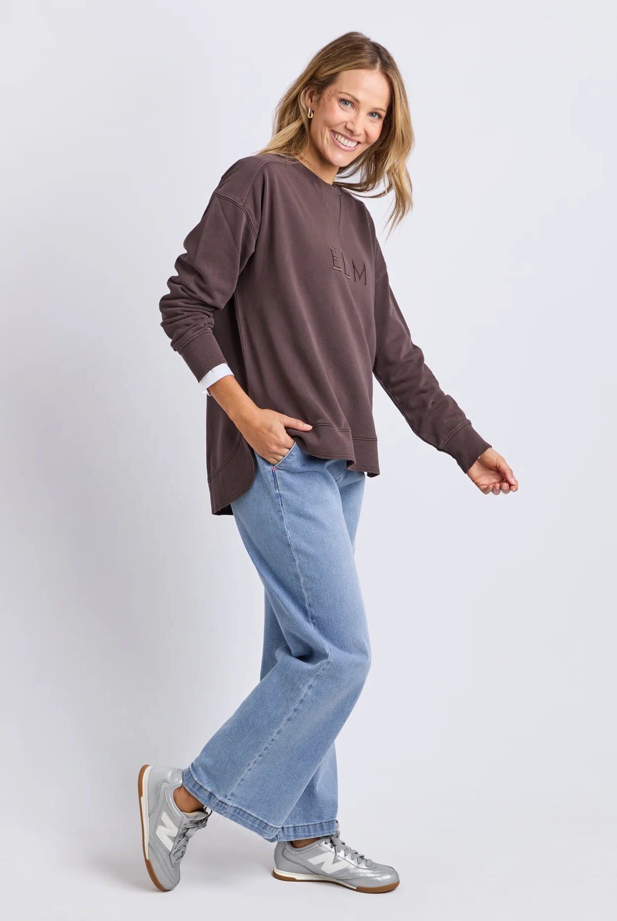 Established Crew in Coffee with chest embroidery, raw hem detail, scooped hemline and a relaxed fit in 100% cotton fleece.