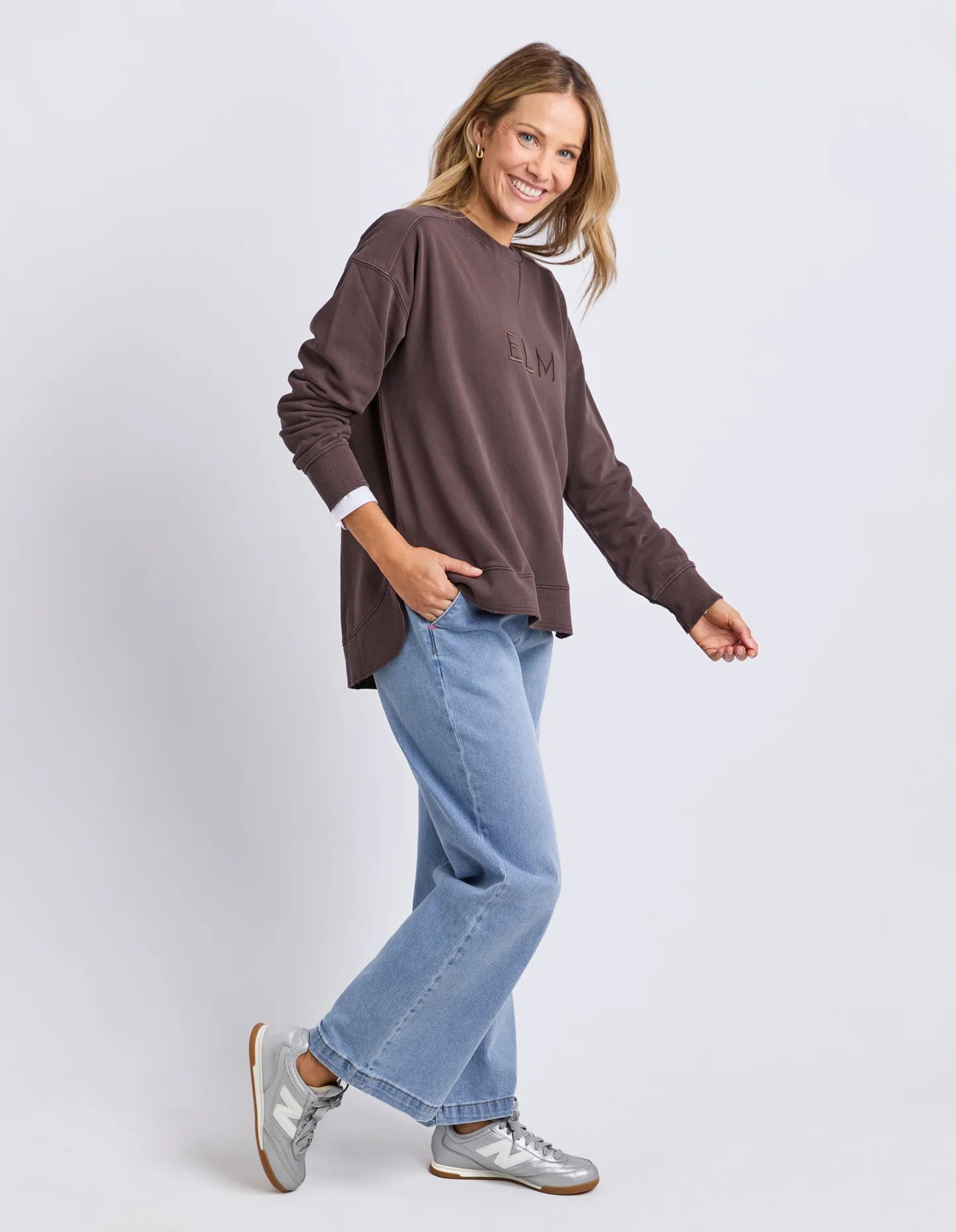 Established Crew in Coffee with chest embroidery, raw hem detail, scooped hemline and a relaxed fit in 100% cotton fleece.