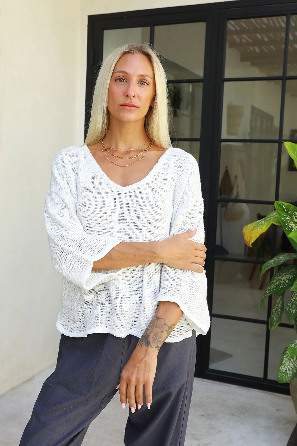 Estelle Hessian V Neck Top in natural white with 3/4 sleeves, V-neckline and scalloped hemline in textured handwoven cotton rayon fabric.