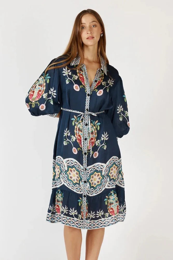 Rubyaya Garcia Dress in navy, a flowing maxi dress with a V-neckline, button-through front, and tie waist in lightweight viscose satin.