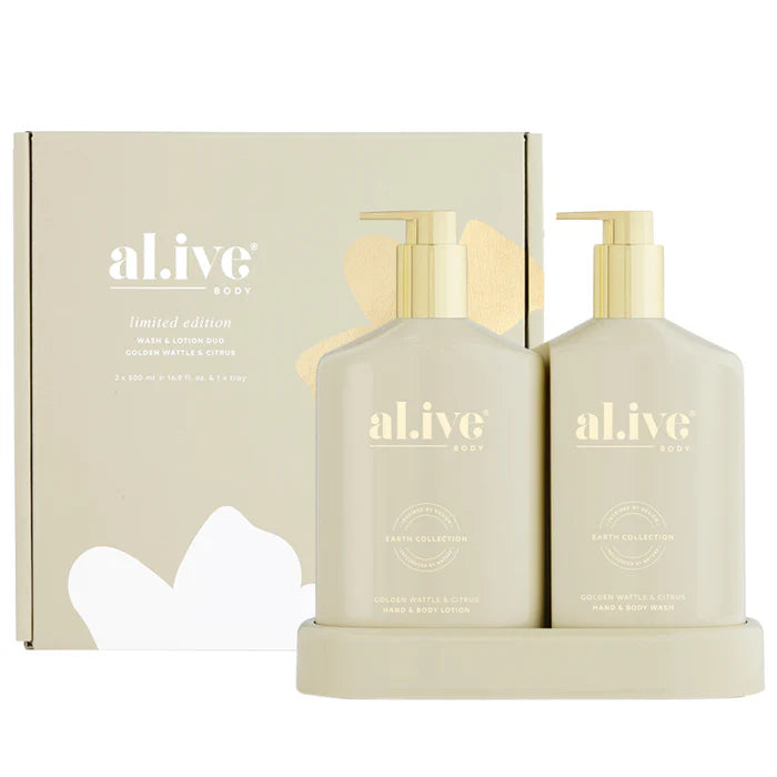The Al.ive Wash & Lotion Duo in Golden Wattle & Citrus, featuring a 500ml Hand & Body Wash and a 500ml Hand & Body Lotion, elegantly displayed on a matching tray. The bottles are adorned with gold accents, reflecting a festive champagne-inspired design. The duo offers a refreshing blend of citrus and warm native botanicals, providing an indulgent, nourishing experience for the skin.