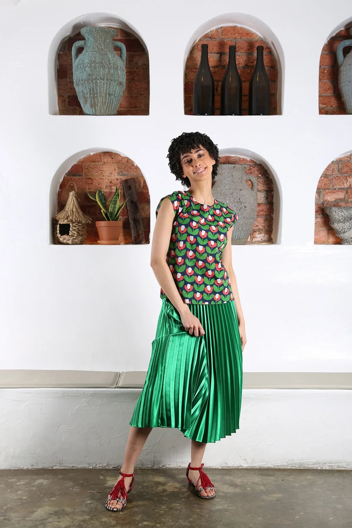 The Green Peace Lily Pleated Skirt by Olga de Polga is currently available at Rawspice Boutique.