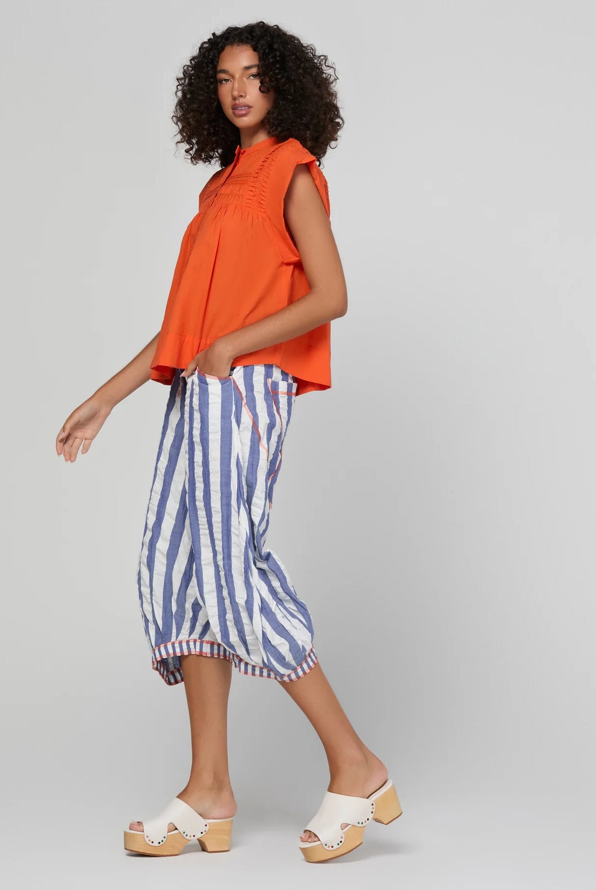 Boom Shankar Guru Pant in Ocean Stripe featuring blue and white stripes, a drawstring waistband, balloon-style legs and 3/4 length.