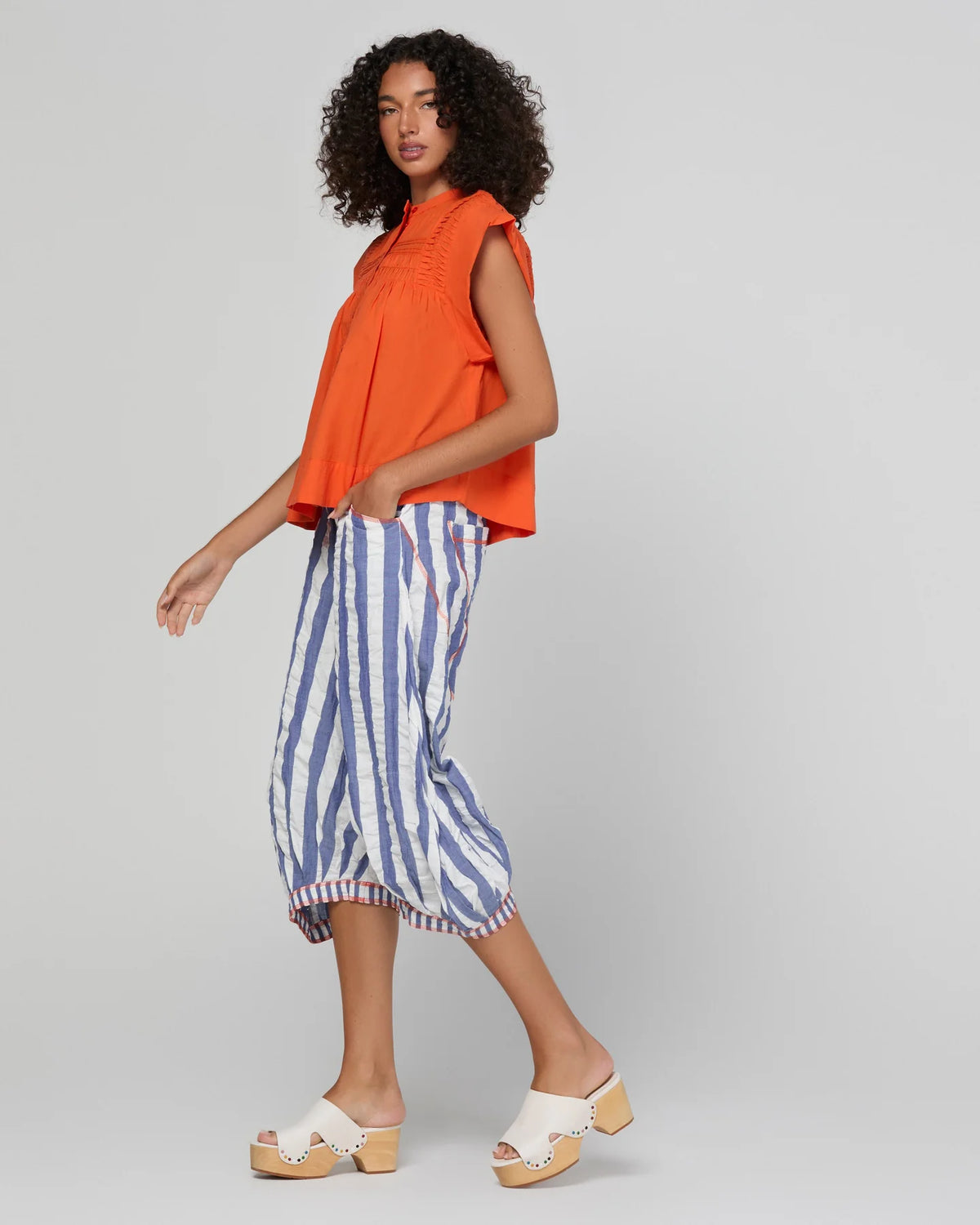 Boom Shankar Guru Pant in Ocean Stripe featuring blue and white stripes, a drawstring waistband, balloon-style legs and 3/4 length.