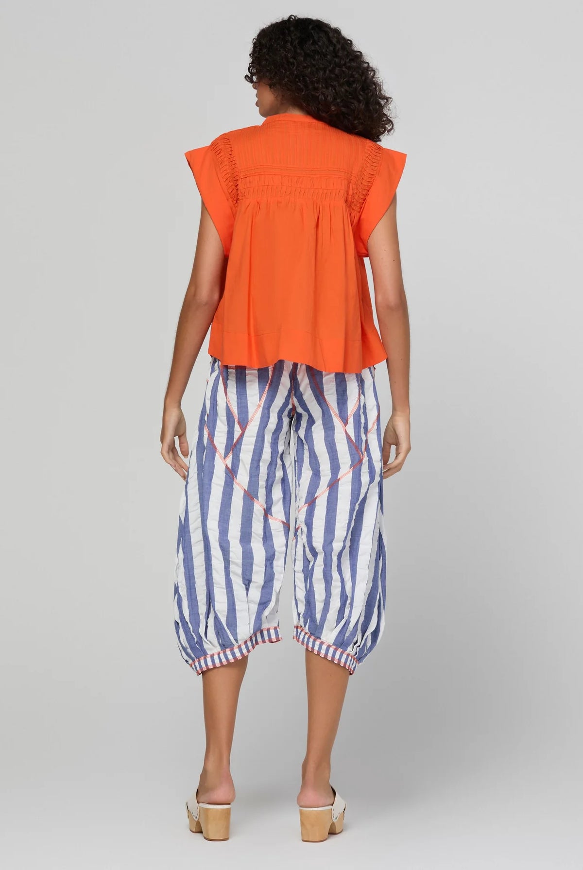 Boom Shankar Guru Pant in Ocean Stripe featuring blue and white stripes, a drawstring waistband, balloon-style legs and 3/4 length.