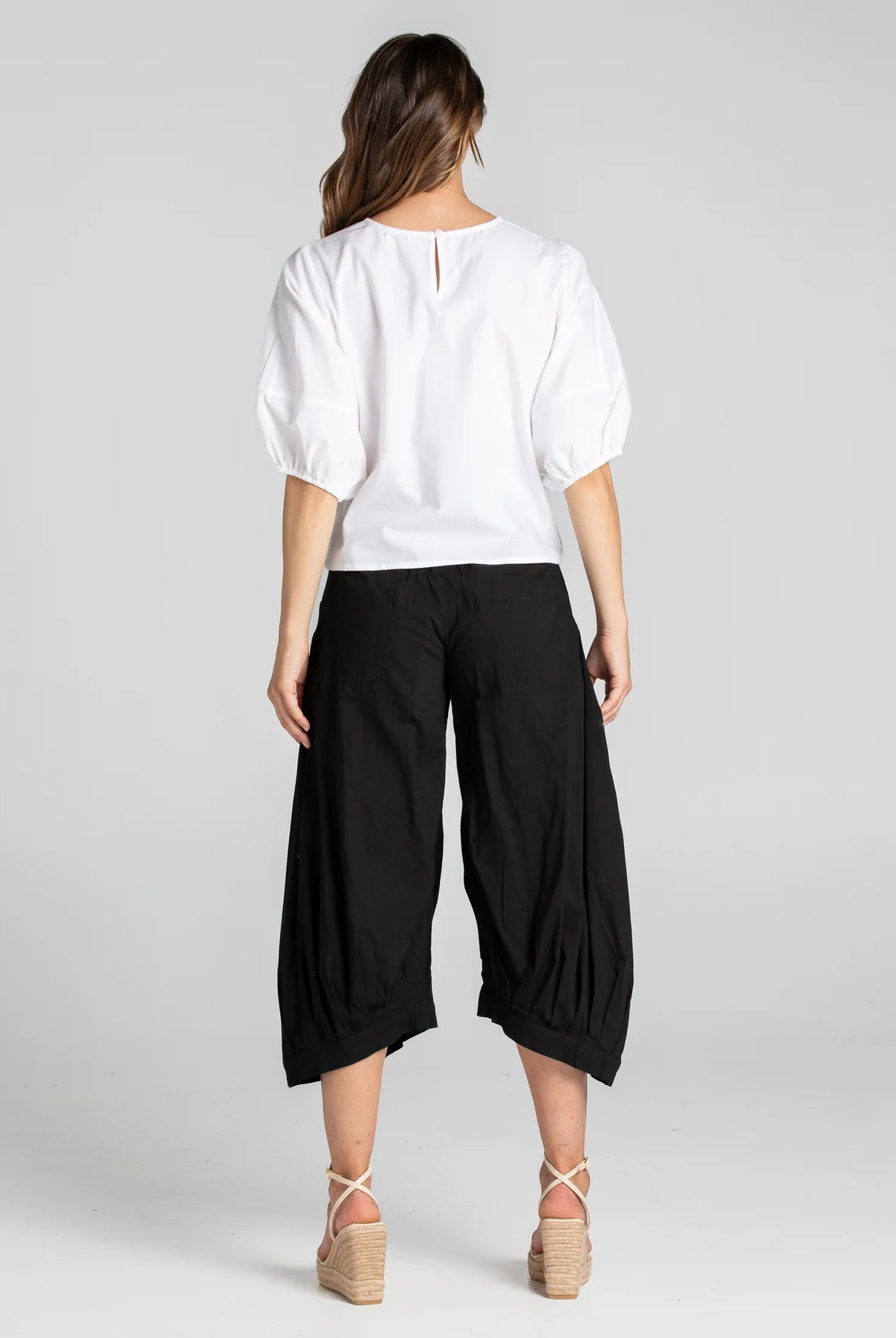Boom Shankar Guru Pant in Coffee, featuring a relaxed fit with a drawstring waistband, 3/4 length, front and back pockets, and signature seam detailing.