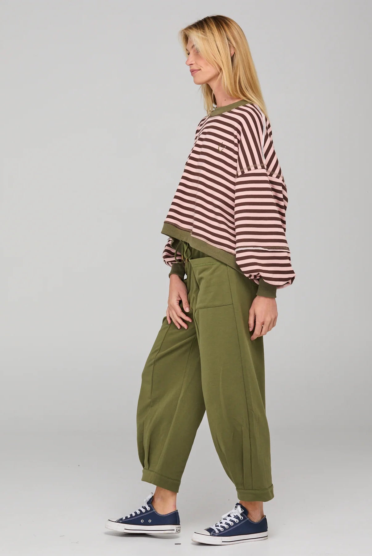 Khaki relaxed fit track pants with drawstring waist, ribbed waistband, contrast stitching and pockets front and back.