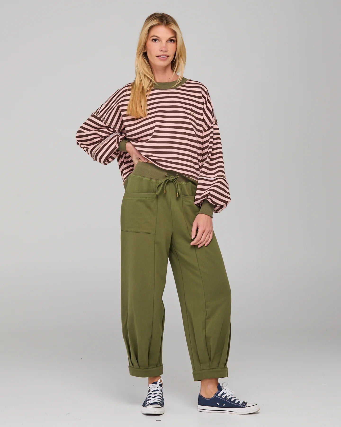 Khaki relaxed fit track pants with drawstring waist, ribbed waistband, contrast stitching and pockets front and back.