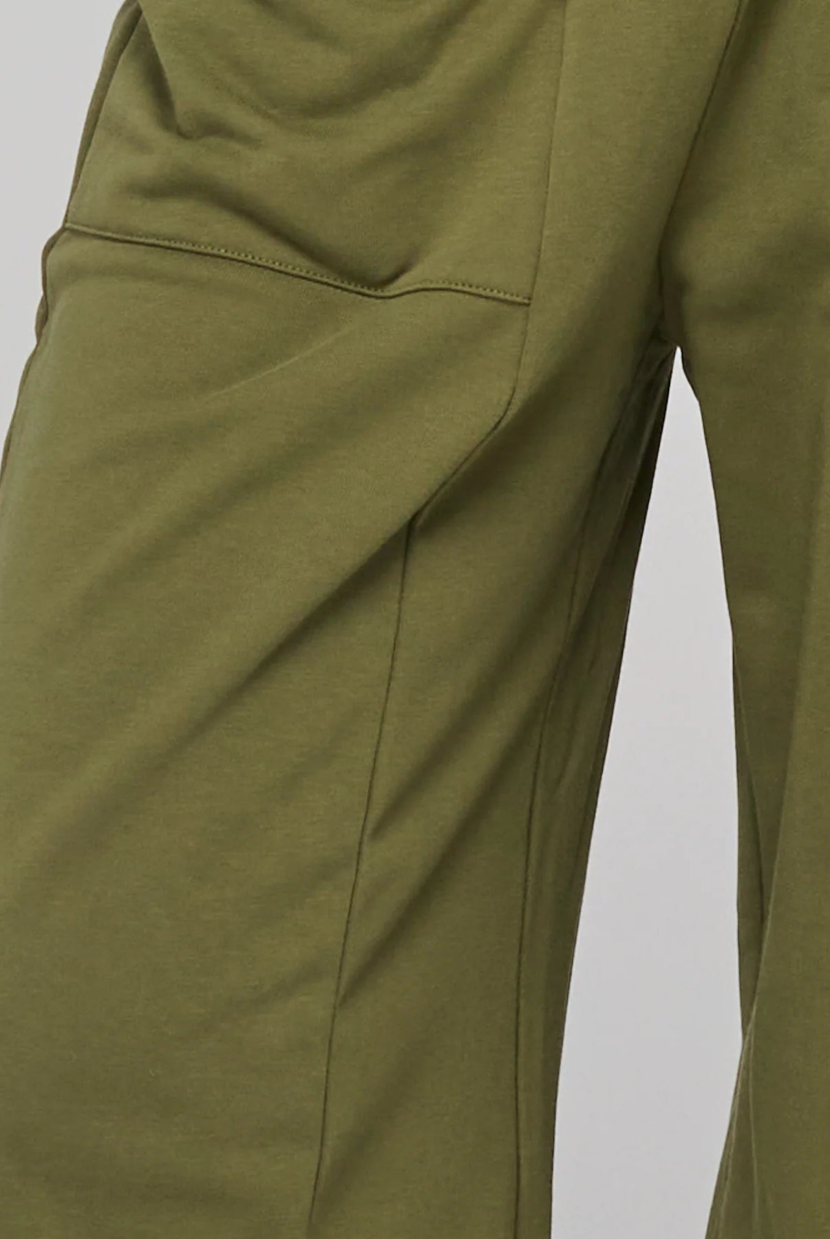 Khaki relaxed fit track pants with drawstring waist, ribbed waistband, contrast stitching and pockets front and back.