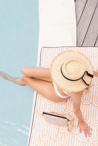 The Ultimate Beach Towel - The Henley by Sky Gazer is available at Rawspice Boutique.