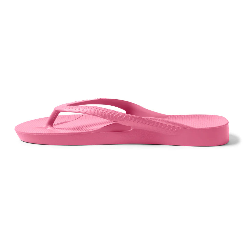 hot pink arch support thongs with contoured footbeds and ergonomic straps for enhanced comfort and stability.