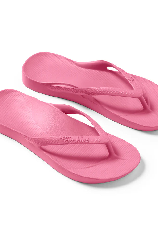 hot pink arch support thongs with contoured footbeds and ergonomic straps for enhanced comfort and stability.