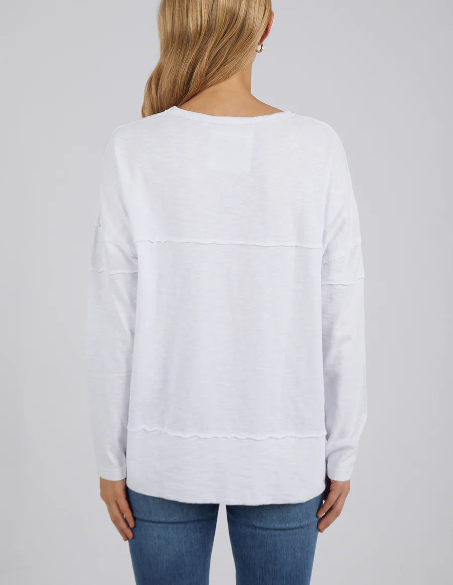 Woman wearing the Jayne Throw On Top styled for a relaxed coastal look.
