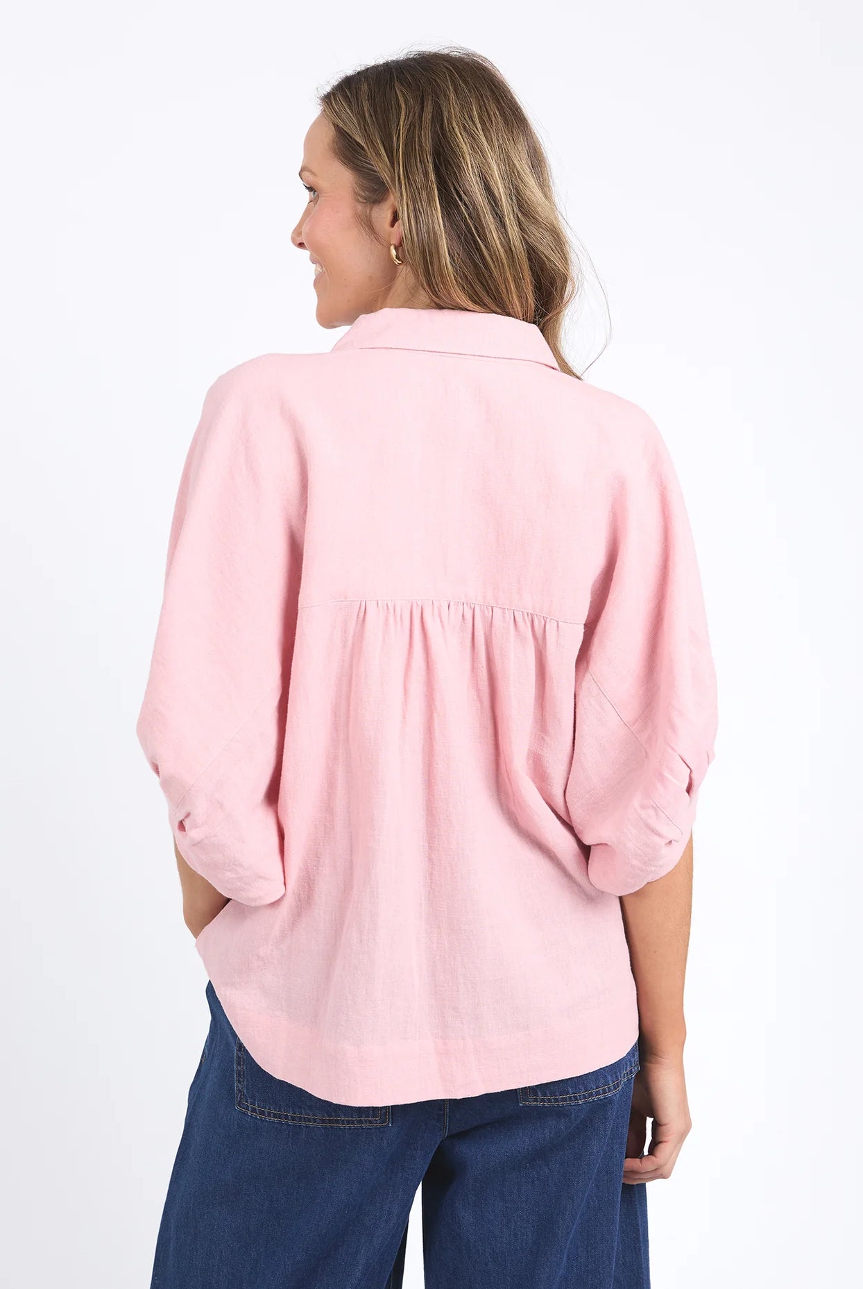 Pink blush oversized linen-viscose shirt with a full button front, collar, and cuffed 3/4 balloon sleeves for a relaxed yet stylish look.