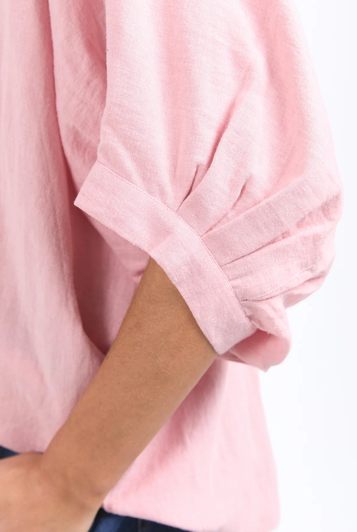 Pink blush oversized linen-viscose shirt with a full button front, collar, and cuffed 3/4 balloon sleeves for a relaxed yet stylish look.