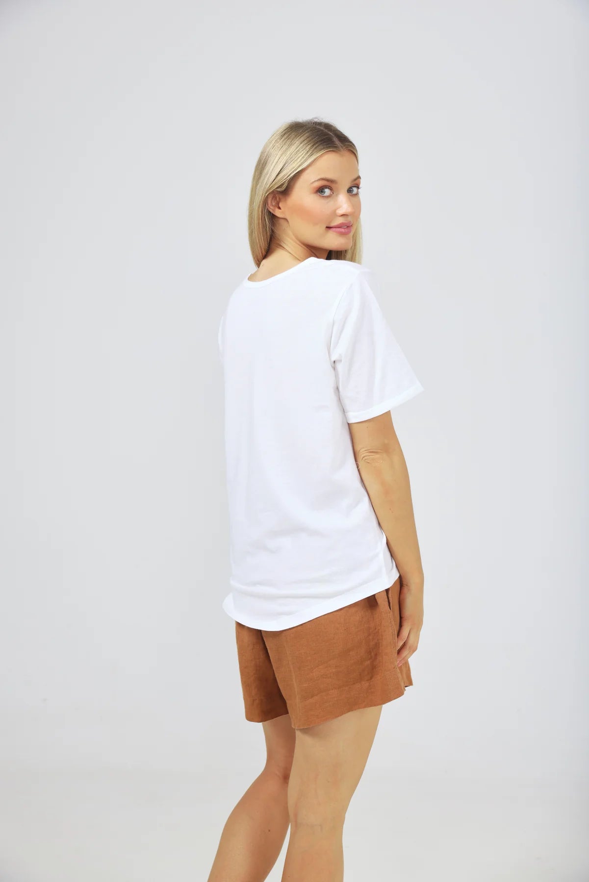 The White Kasai Short Sleeve Tee by The Shanty Corporation is available at Rawspice Boutique.