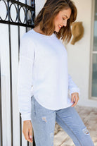 Winter White Zip Back Knit Jumper with a high scoop neckline, long sleeves with turned-up cuffs, dropped shoulders, and silver zipper detail at the back.
