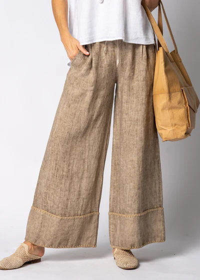 Latte full-length linen pants made from 100% lightweight, breathable linen. Designed with an airy, relaxed cut for unrestricted movement and all-day comfort, offering a clean, timeless look suitable for warm-weather wear