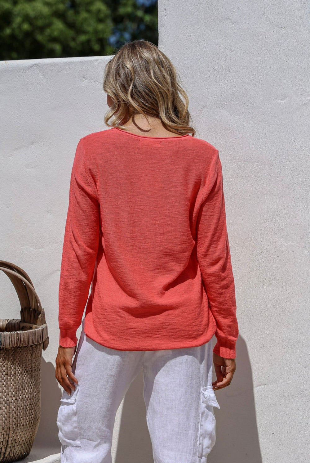 Coral 100% cotton light knit top with a breathable, timeless design, ideal for layering or wearing alone for everyday comfort and style.