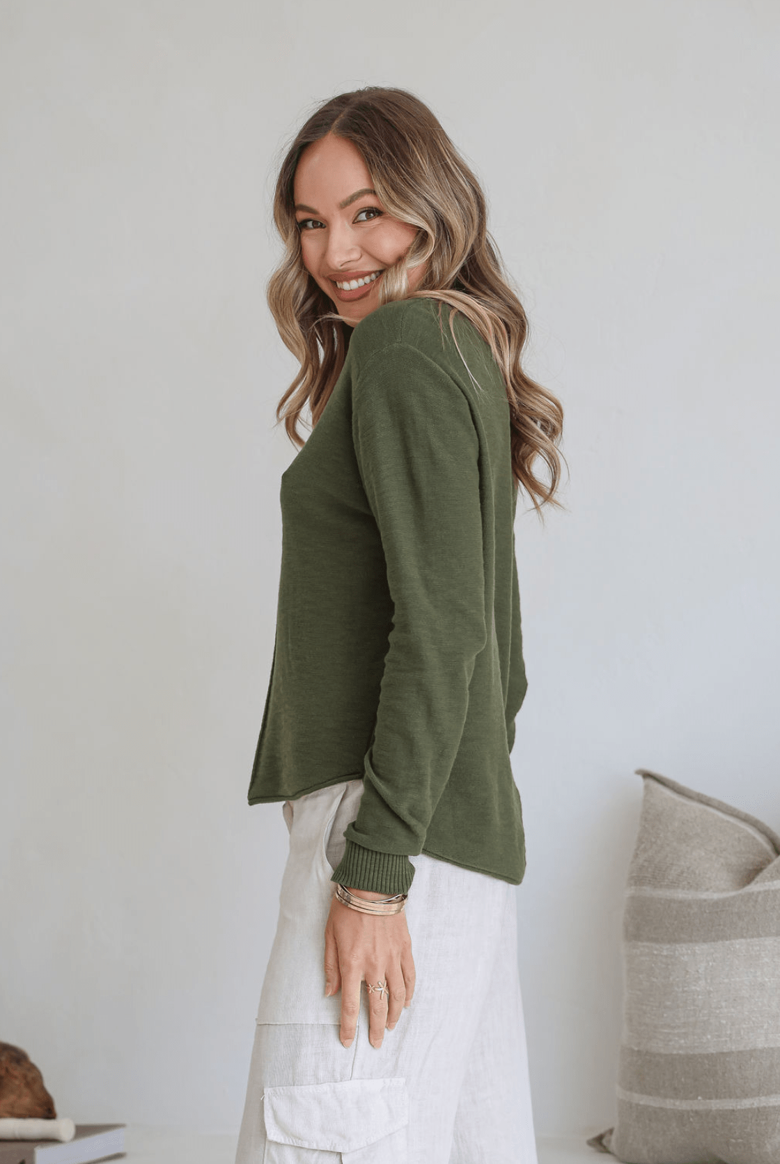 Moss 100% cotton light knit top with a breathable, timeless design, ideal for layering or wearing alone for everyday comfort and style.