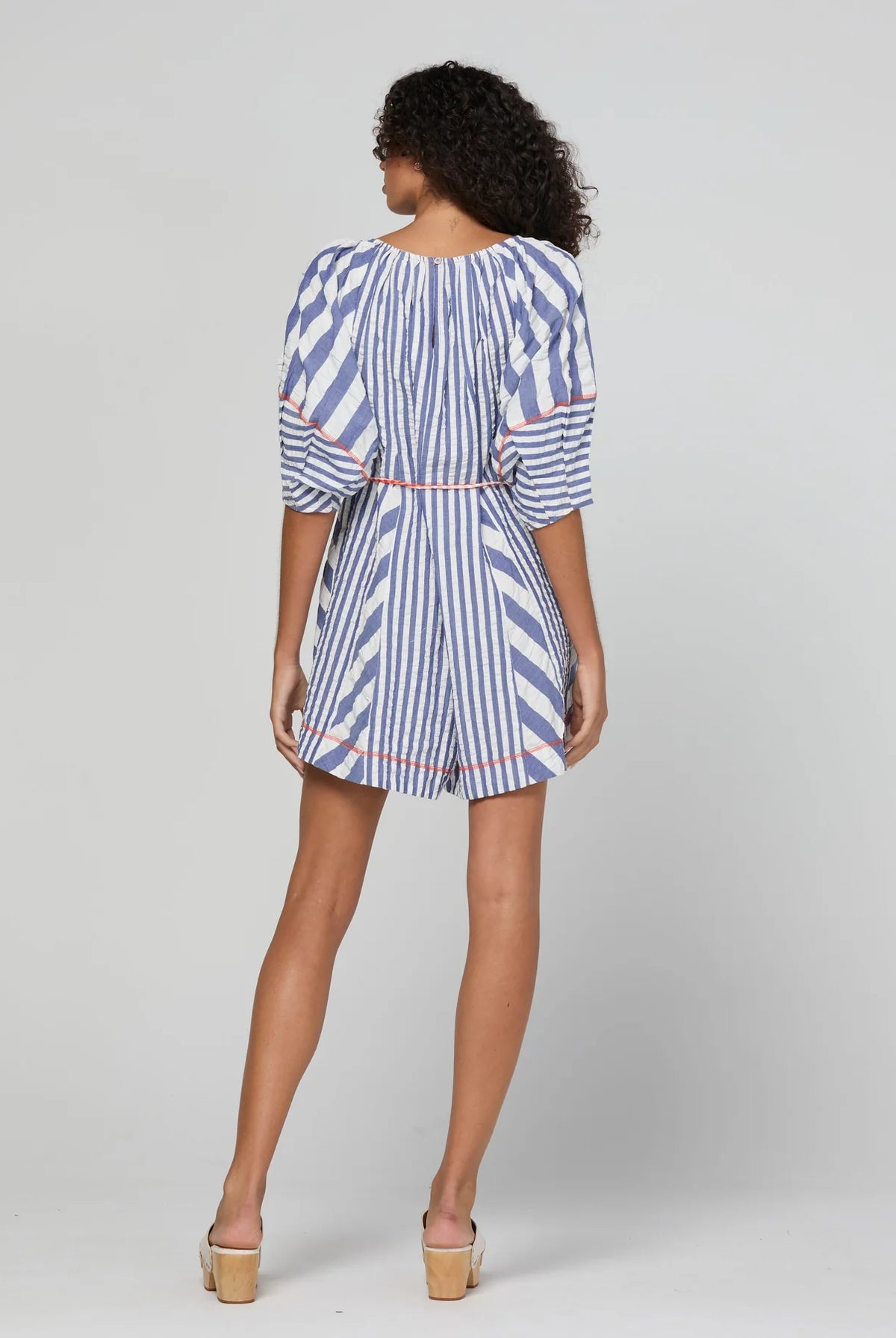 Boom Shankar Lucia Playsuit in Ocean Stripe with a tie neckline, balloon sleeves, contrast cuffs, gingham waist tie and relaxed fit.