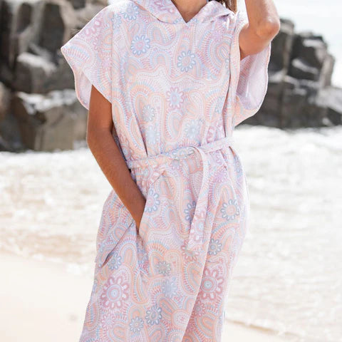 The Malua Surf Poncho is a sand-free, super-absorbent, quick-drying hooded towel. Lightweight, antibacterial, and soft, with a pocket and optional waist tie.