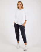 White Mazie Sweatshirt crafted from soft, cozy fabric, featuring a relaxed fit, ribbed cuffs, and a classic crew neckline for effortless comfort and style.